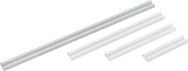 In the image, there are four elongated metal profiles in a silver hue. They vary in length and are each straight and narrow, suitable for various applications.