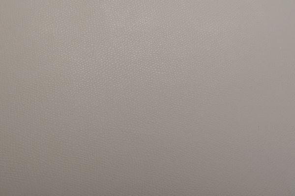 Das Bild zeigt eine einfarbige, matte Oberfläche in Grautönen, ohne erkennbare Muster oder Gegenstände. Es wirkt schlicht und neutral, fast wie ein leeres Blatt.