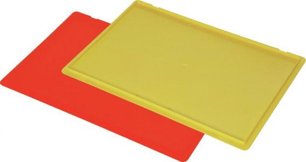 There are two rectangular plates visible. One is yellow and the other is red. They are flat and made of a material that appears lightweight. The yellow plate is on top of the red one.