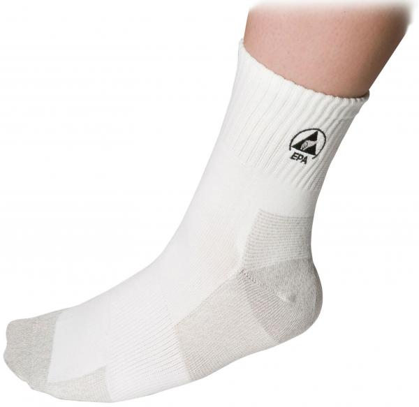 The image shows a white sock being worn on a foot. At the top edge, there is a ribbed pattern, and on the side, a black logo is visible. The foot is slightly raised.