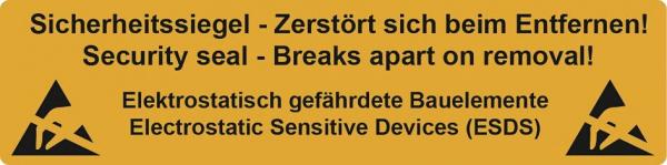 Das Bild zeigt ein gelbes Sicherheitssiegel mit schwarzer Schrift. Es warnt, dass es beim Entfernen zerbricht, und informiert über elektrostatisch gefährdete Bauelemente.