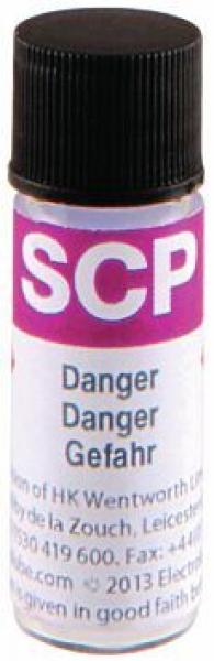 The image shows a small bottle with a black cap. On the label it says "SCP" and the warning "Danger Gefahr" in purple, with additional contact information in small print.