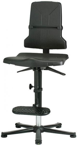 The image shows an adjustable-height, black office chair with a backrest. The seat is lightly padded, and there is a footrest as well as a base plate with five casters.