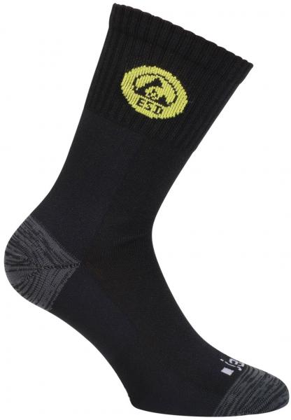 The image shows a black sock with a high shaft. On the outside, there is a yellow logo with a mountain symbol woven in. The foot area has a gray structure.