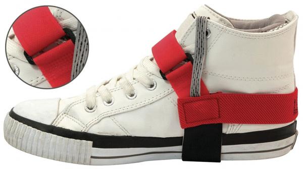The image shows a white sneaker with a red securing strap. The strap wraps around the shoe to improve its grip. In the smaller image section, the strap can be seen in more detail.