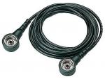 Preview: Das Bild zeigt ein schwarzes Audiokabel mit zwei runden Steckern an beiden Enden. Das Kabel ist spiralförmig gewunden und hat eine glatte Oberfläche.