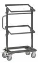 Preview: The image shows a narrow, black shelving cart with three shelves. It has a handle and four wheels, making it mobile. The structure is stable and square.