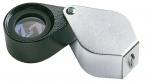 Preview: The image shows a magnifying glass with a round, blackened glass part and a silver, angular casing. The magnifying glass has a folding mechanism and a textured surface.