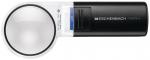 Preview: The image displays a black reading magnifier with a large, round lens and an integrated LED light. There is a compartment for batteries on the side. The magnifier has a modern, functional look.