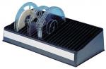 Preview: The image shows a black tray with two transparent spools. The spools are centered, and the tray features a textured surface with horizontal lines.
