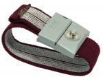 Preview: The image shows an elastic bracelet made of red and gray fabric. In the center is a gray buckle with a snap button that fastens the bracelet.