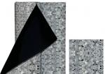 Preview: The image shows a roll of gray, textured material containing small, light and dark particles. Part of the roll is unrolled, revealing the black backside. Beside the roll, there is a smaller piece of the material.