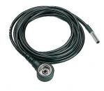 Preview: The image displays a black, flexible cable with a round, flat connector on one side and a thin, straight plug on the other side.