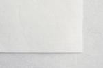 Preview: Das Bild zeigt ein schlichtes, weißes Blatt Papier, das auf einem hellen Untergrund liegt. Die Textur des Papiers ist leicht strukturiert.