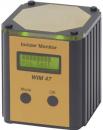 Preview: The image displays a square device with rounded corners, a black casing, and a gold-colored top section. It features a digital display with various buttons below it.