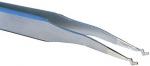 Preview: The image shows a metallic tweezer with two pointed, curved ends. It has a silver surface and is used for gripping small objects or hairs.
