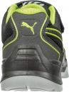 Preview: The image shows the back of a black sports shoe with a green accent. The Puma logo is displayed on the heel. The sole structure is sturdy and provides good grip.