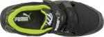 Preview: The image shows a black sports shoe with a green insole. The shoe features a wide Velcro strap and a sporty design. The Puma logo is clearly visible.
