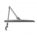Preview: The image shows a modern desk lamp with an elongated, flat lampshade and flexible arms. It is in gray and has a clamp for attaching to a desk.