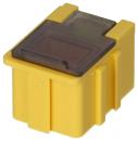Preview: The image shows a small, rectangular plastic block in bright yellow. On the top, there is a dark, transparent area. The block has lateral notches.