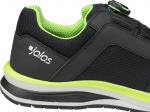 Preview: Das Bild zeigt einen schwarzen Sport-Schuh mit grünen Akzenten. Es hat eine strukturierte Oberfläche und eine weiße Sohle. Auf der Seite ist das Logo 