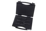 Preview: The image shows a black suitcase with an open flap. Inside, several long, thin tools are arranged in a row, lying on a soft, velvety surface.
