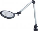 Preview: The image shows a magnifying lamp on a flexible arm. The lens is round and has a transparent area in the center. The arm can be adjusted to various positions.