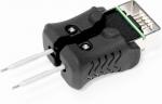 Preview: Das Bild zeigt ein Gerät, das wie ein schwarzer Handgriff mit zwei metallenen Stiften aussieht. Es hat einen Stecker am oberen Ende und ist zum Testen oder Programmieren von elektronischen Bauteilen gedacht.
