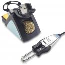 Preview: The image shows a soldering iron with a holder. The holder has a round opening and contains a brass cleaning spiral. A pressure device is attached to the cable of the iron.
