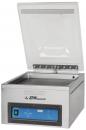Preview: The image shows a silver vacuum sealing machine with a rectangular container and a lid that opens on the top. On the front, there is a control panel with buttons and a display.