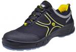 Preview: Der Schuh ist ein sportlicher Sneaker in Schwarz mit gelben und grauen Akzenten. Er hat ein leichtes, funktionales Design und eine robuste Gummisohle für guten Halt.