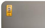 Preview: The image shows a gray surface with a rounded corner. In the top left, there is a yellow label with the text 