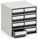 Preview: The image shows a simple, square dresser with nine drawers in two rows. The drawers have white fronts and a gray frame. One drawer is pulled out.