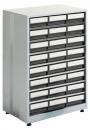 Preview: The image shows a straight, square cabinet with several drawers. It has a metallic casing and is in light gray, while the drawer fronts are black and white.