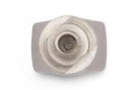Preview: The image shows a silver hexagonal nut lying flat on a bright background. The nut has a central opening and an angled, hexagonal shape.
