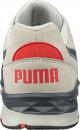 Preview: The shoe is a sporty sneaker in gray with a red accented area on the heel. The well-known logo 