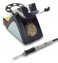 Preview: The image shows a soldering station. It consists of a stable base with a holder for a soldering iron, a sponge for cleaning, and a container with solder. A cable connects the iron.