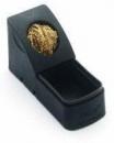 Preview: The image shows a small, black pipe cleaner with a golden sponge on top. It has a semi-circular shape and a small shelf. The sponge is soft and textured.