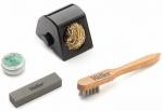Preview: The image shows four tools: a black soldering station with a golden spiral, a round can with green contents, a gray grinding stone, and a wooden brush with metal bristles.