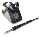 Preview: The image displays a soldering iron kit. On the right is a soldering iron with a black handle and a metallic tip. On the left, there is a stand with a yellow sponge.