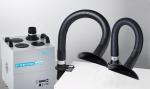 Preview: The image shows a smoke extraction device with a rectangular, gray casing and two black, flexible hoses that are bent upwards providing exhaust air.