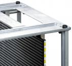 Preview: The image shows a large, rectangular metal frame with a transparent, flat top. Below it are vertical, black slats and numbered scales from 42 to 50.