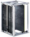 Preview: The image shows a rectangular, metallic structure with two vertical, narrow panels made of black plastic. These are designed with several horizontal grooves.