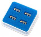 Preview: The image shows a transparent box with a blue foam insert. Inside, there are four metallic parts that are L-shaped and gold-colored on one side.