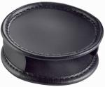Preview: The image shows a round, flat object in black plastic and leather. It has slightly raised edges and a smooth surface, conveying a modern, elegant impression.