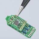 Preview: The image shows a green circuit board in a technical environment. A pair of tweezers is holding a small component in place. The surface is equipped with various components and connections.