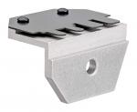 Preview: The image shows a metal mounting block. The top features a black, flat surface with two threaded screws. The underside is slightly inclined and has mounting holes.