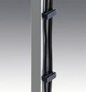 Preview: The image shows a vertical metal post with several black cables running along the side. These cables are attached to the post with black brackets.