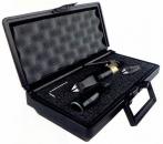 Preview: The image shows a black toolbox that is open. It contains several tools, including pliers and two other black objects, all on a foam-padded floor.