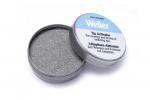 Preview: It is a round, flat metal tin that is open. The contents are gray powder on the inside. The lid is labeled 